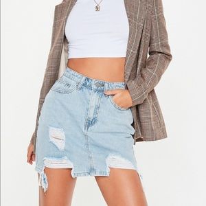 Distressed jean skirt